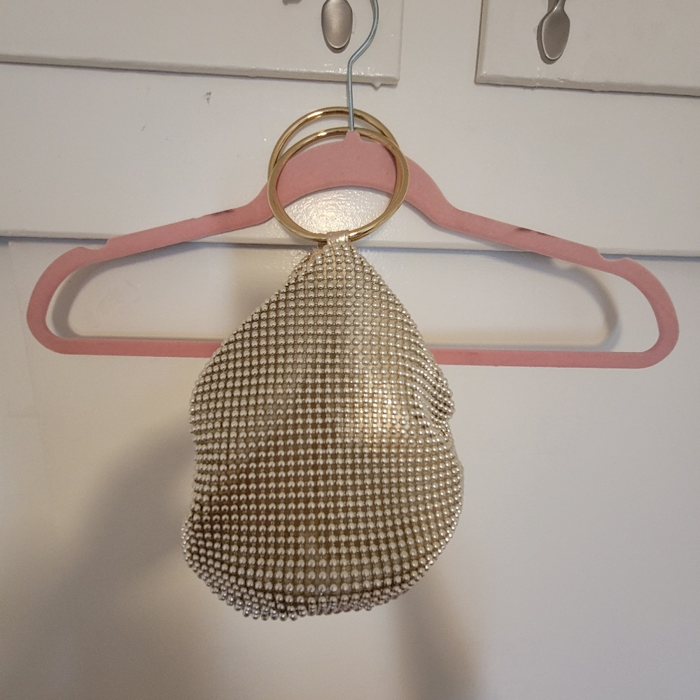 Mesh handle gold bag